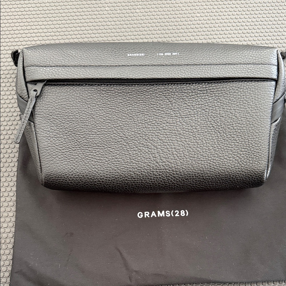 GRAMS (28) 156. City Sling Black Leather Originally $289 New